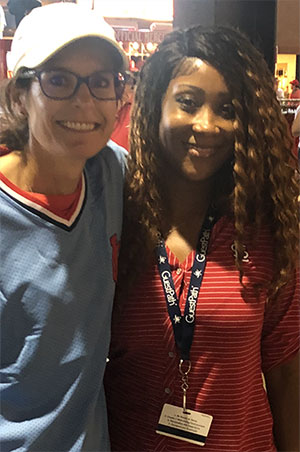 Dr Pascual and Tasha, her MA, enjoying a Cardinal game